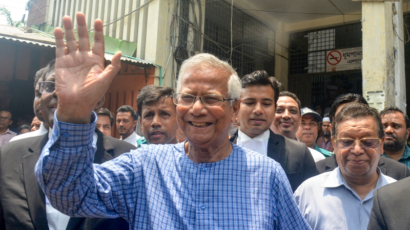 Muhammad Yunus (C) addresses the media at the Special Judge Court in Dhaka on 12 June 12