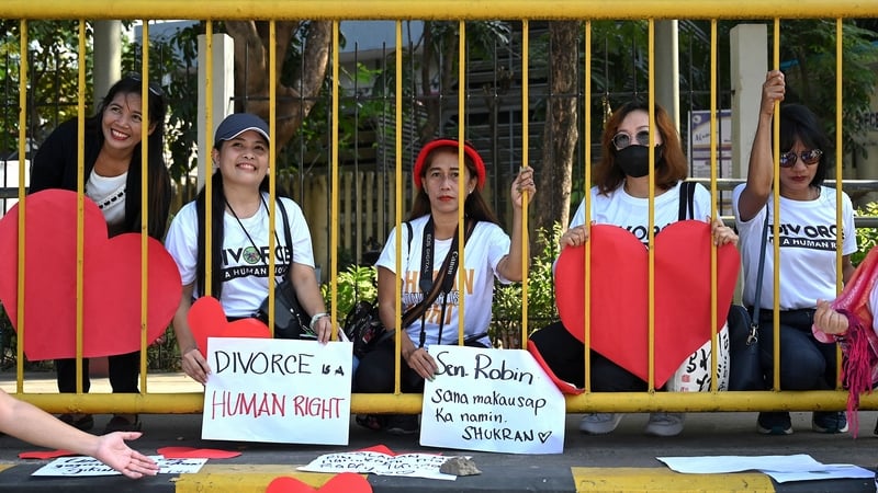 Pro-divorce protesters taking part in a demonstration on Valentine's Day 2023 in front of the Senate Building in Pasay, Metro Manila. The Philippines is the only place outside the Vatican where divorce is outlawed. Photo: Getty Images