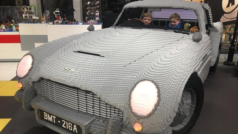 Max and Sonny in a Lego Aston Martin - the old James Bond car!