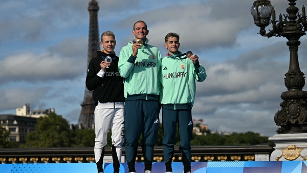 Gold medallist Kristof Rasovszky is flanked by Oliver Klemet and David Betlehem
