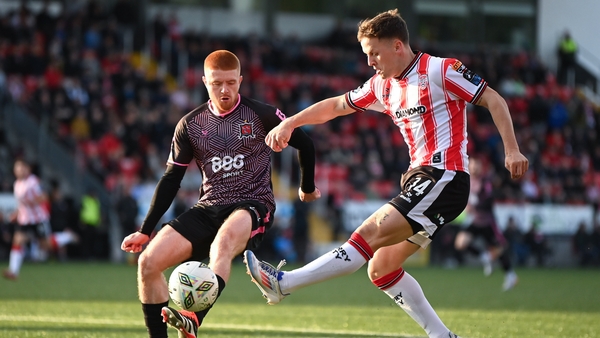 Ben Doherty of Derry City in action against Dundalk's Aodh Dervin