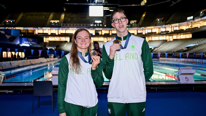 Mo' money, mo' medals? Irish Olympic swimming medallists Mona McSharry and Daniel Wiffen show off their haul