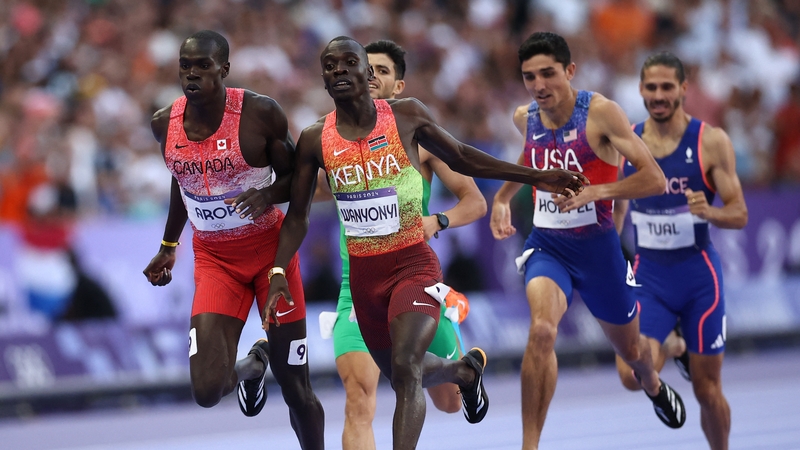 Emmanuel Wanyonyi crosses the finish line in the 800m to become an Olympic champion