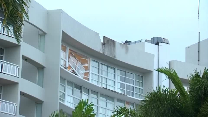 Emergency crews were called after a twin-engine helicopter crashed into the hotel roof