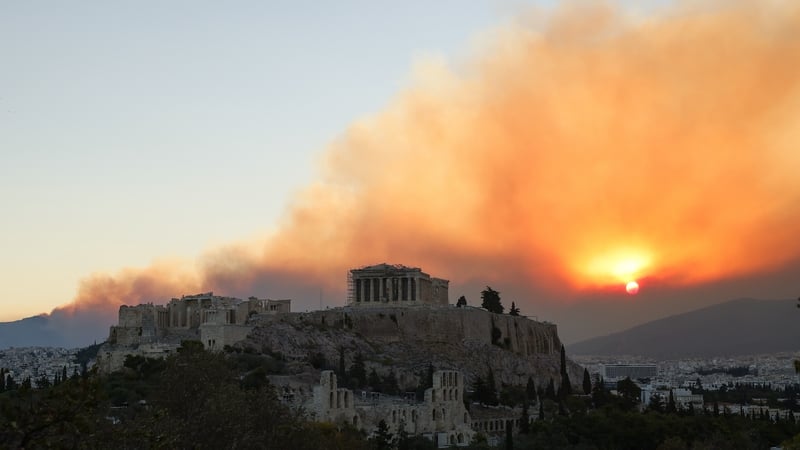 Authorities ordered at least five more communities and two hospitals northeast of Athens to leave as the wildfire spread