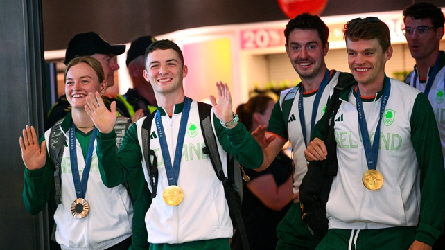 Medalists Mona McSharry, Rhys McClenaghan, Daire Lynch and Fintan McCarthy arriving at Dublin Airport