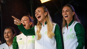 Women's 4x400m relay member Sharlene Mawdsley, centre, with from left, Phil Healy, Sophie Becker and Kelly McGrory are welcomled by supporters on O'Connell Street