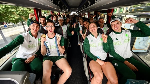 More of this please: Irish Olympians Shane Ryan, Daniel Wiffen, Mona McSharry and Darragh Greene take the bus to the homecoming celebrations at Dublin's O'Connell Street. Photo: Ramsey Cardy/Sportsfile