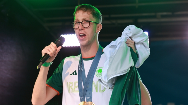 Daniel Wiffen addresses the crowd on O'Connell Street in Dublin during the homecoming event