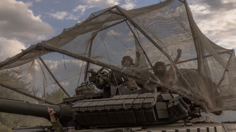 Ukrainian servicemen drive a Soviet-made T-64 tank in the Sumy region, near the border with Russia