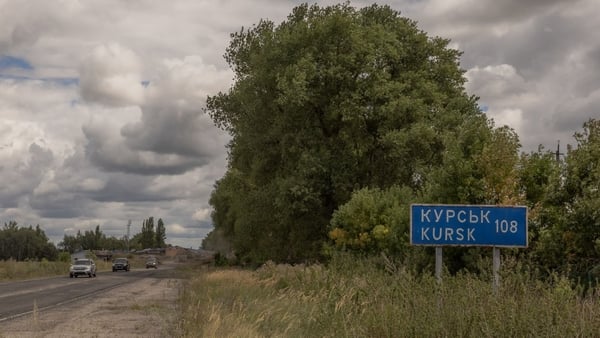 Ukrainian military vehicles driving past the border crossing point with Russia, during the surprise offensive on Kursk. Photo: Getty Images