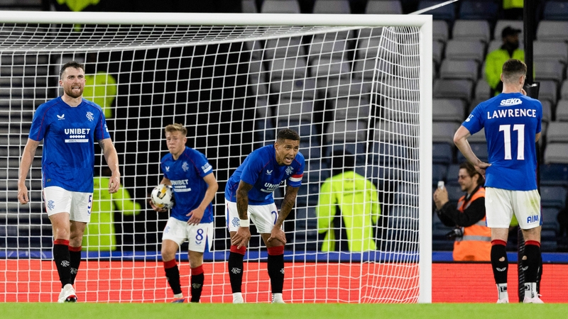 Rangers' James Tavernier (centre) looks dejected