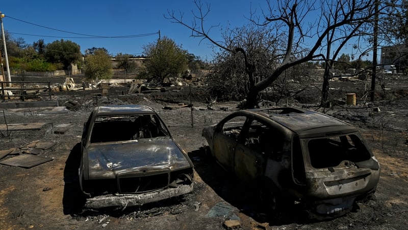 The fire destroyed about 100 homes as well as other buildings and cars