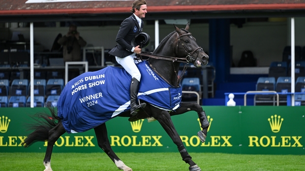Darragh Kenny, on Chic Chic, acknowledges the crowd after his victory in the Sport Ireland Classic