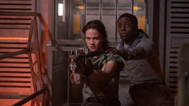 Cailee Spaeny as Rain Carradine and David Jonsson as Andy