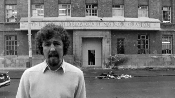 Forbes McFall outside BBC Broadcasting House in Belfast following bombing, 1974