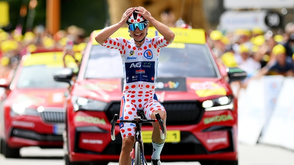 Justine Ghekiere celebrates at the finish line
