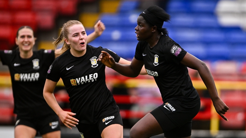 Athlone Town's Brenda Ebika Tabe (R) wheels away in celebration