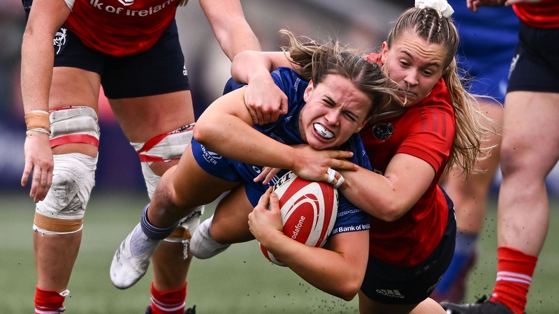 Robyn O'Connor is tackled by Lucia Linn