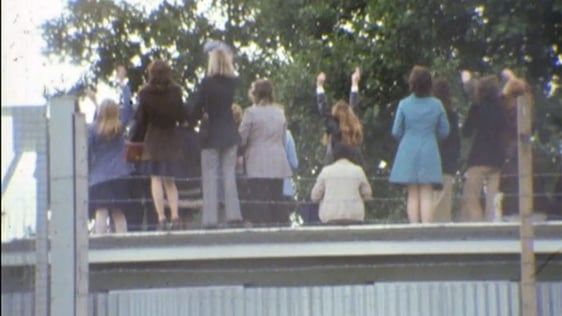 Women wave at detainees at the Maze Prison, near Belfast in 1974