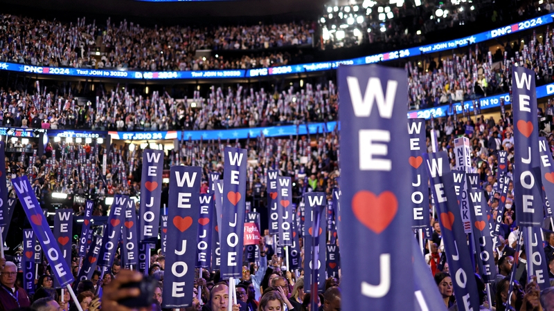 Delegates hold up 'We heart Joe' signs at Chicago's United Center