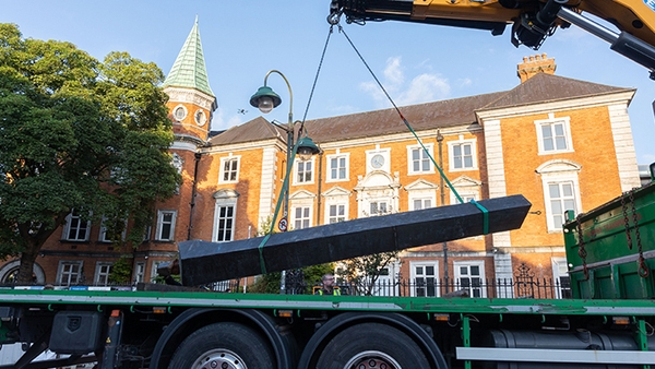Obelisk of Bronze by Michael Warren, the tallest sculpture in Crawford Art Gallery's collection, being removed by crane today