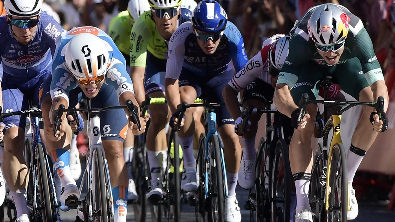 Team DFP's Pavel Bittner (L) just gets ahead of Team Visma's Wout van Aert