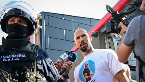 Andrew Tate spoke to journalists after a ten-hour long raid by police at his residence in Bucharest