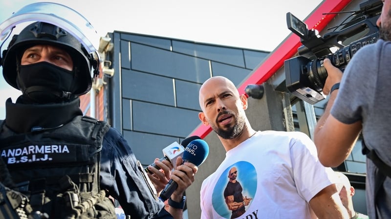 Andrew Tate spoke to journalists after a ten-hour long raid by police at his residence in Bucharest