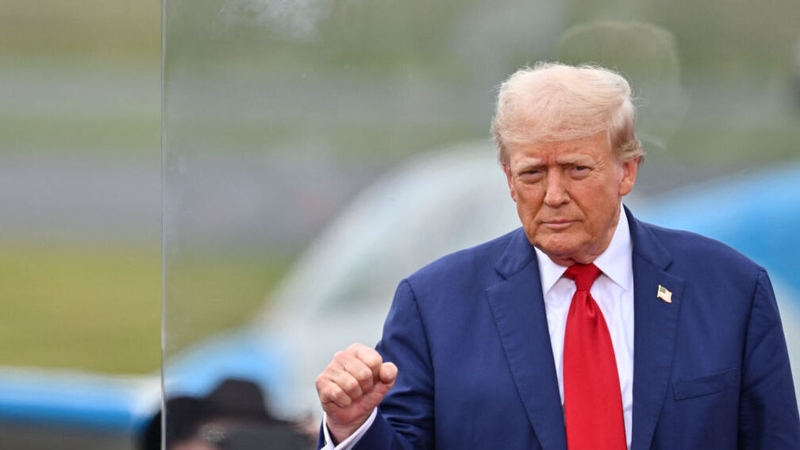 Donald Trump appeared on stage behind bulletproof glass