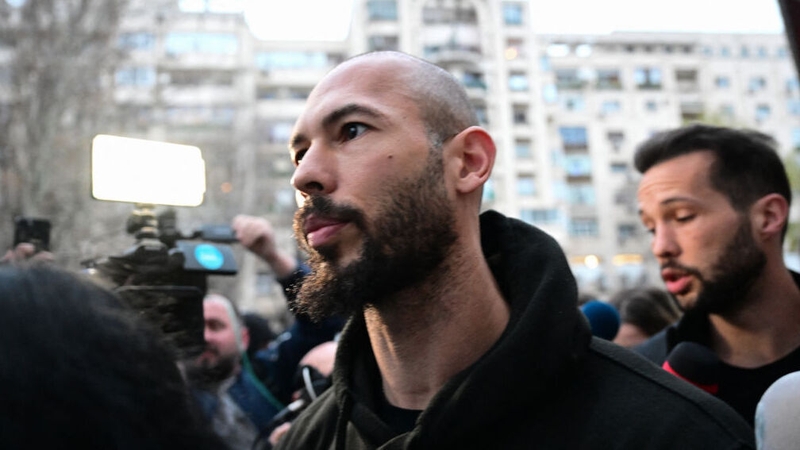 Andrew Tate pictured with his brother Tristan (R) after a court hearing earlier this year