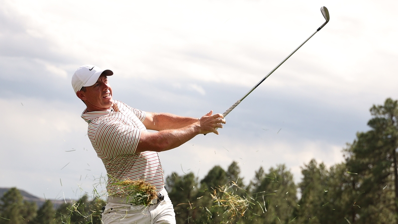 Rory McIlroy plays a shot at the 17th at Castle Pines Golf Club