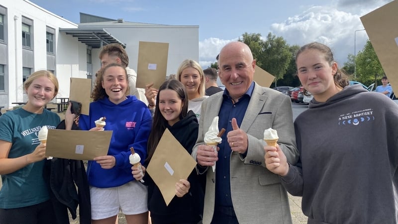 Smiles and ice creams all round as Castletroy College principal Padraig Flanagan celebrates with some of this year's Leaving Cert students receiving their results