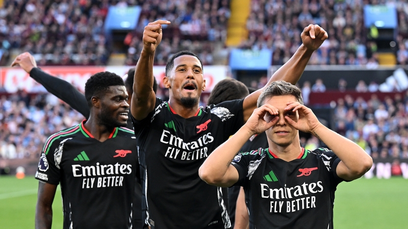 Leandro Trossard (r) scored the Gunners' opening goal