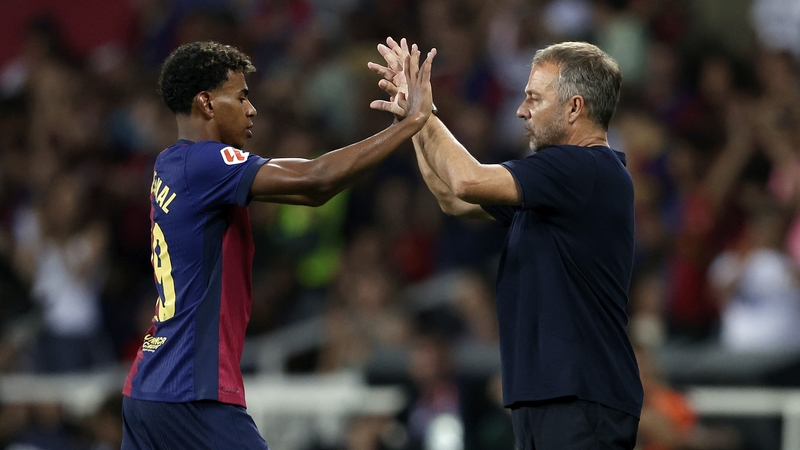 Lamine Yamal with head coach Hansi Flick