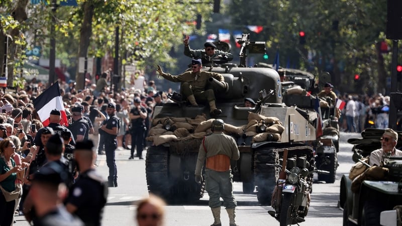 The parade featured vintage military vehicles, as surviving veterans of the 2nd Armoured Division looked on