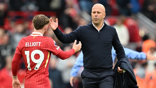 Arne Slot congratulates Harvey Elliott after the Anfield victory