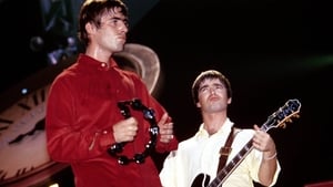 Liam Gallagher and Noel Gallagher performing live onstage, 1997. Photo by Simon Ritter/Redferns