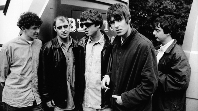 L-R: Tony McCarroll, Paul 'Bonehead' Arthurs, Noel Gallagher, Liam Gallagher, Paul 'Guigsy' McGuigan, pictured in 1994. Photo by Michel Linssen/Redferns.