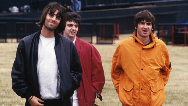 L-R Liam Gallagher, Paul 'Guigsy' McGuigan and Noel Gallagher pictured in 1996. Photo by Mick Hutson/Redferns.