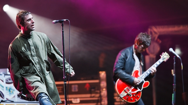 Liam and Noel Gallagher perform at the Melt! Festival in Germany, 2009. shortly before Noel left the band. Photo by Marco Prosch/Getty Images.