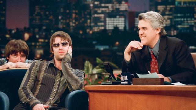 Noel and Liam Gallagher during an interview with host Jay Leno, 1998. Photo by: Margaret Norton/NBC/NBCU Photo Bank.