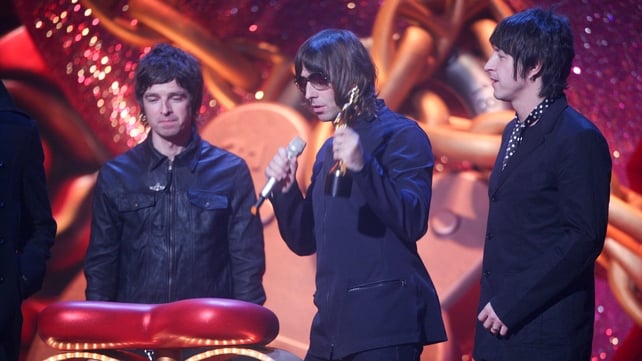 Oasis accept Outstanding Contribution to Music at the Brit Awards in London, 2007. L-R Noel Gallagher, Liam Gallagher, Gem Archer. Photo by JM Enternational.