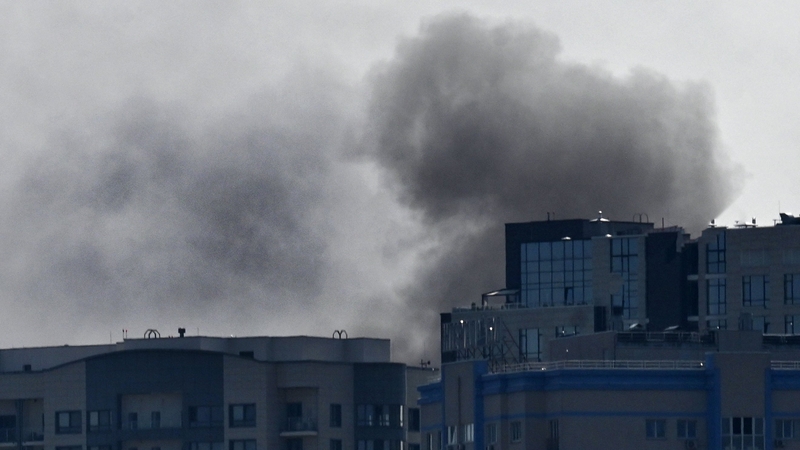 Smoke rises over buildings following a Russian drone attack in Kyiv, Ukraine