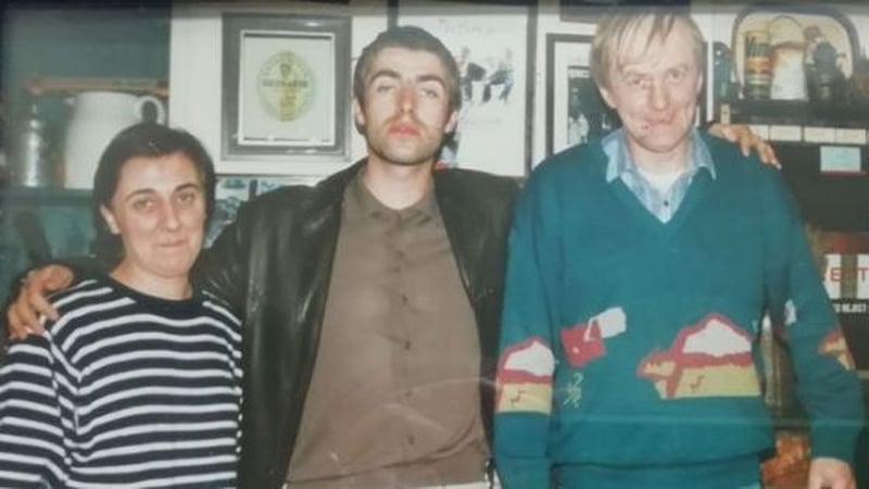 Liam Gallagher, pictured over 20 years ago, with John Finan and his wife Bridie