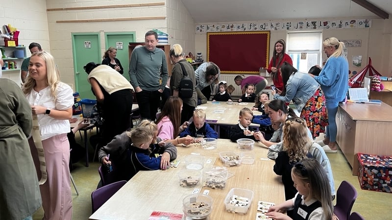 Parents and their children at St Mary's Junior School in Clondalkin this morning