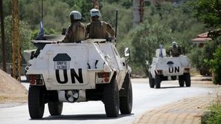 UNIFIL vehicles in transit after an Israeli airstrike in Hiyam