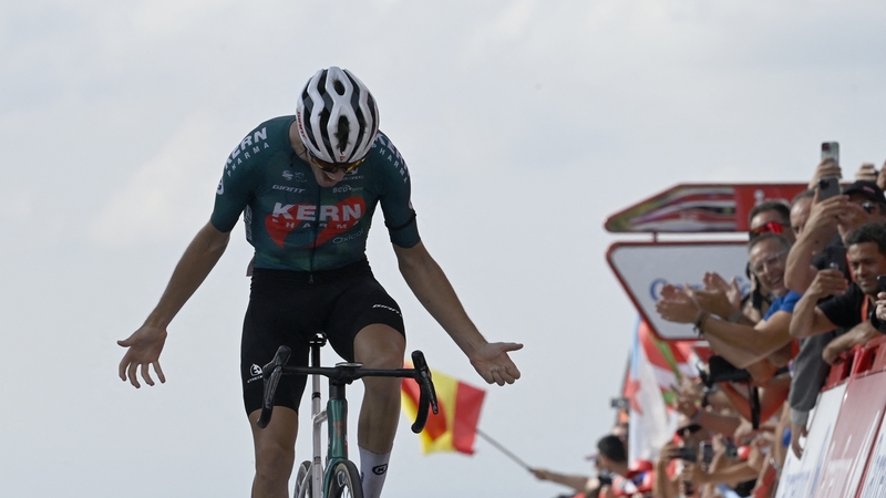 Pablo Castrillo celebrates crossing the line to take stage 12