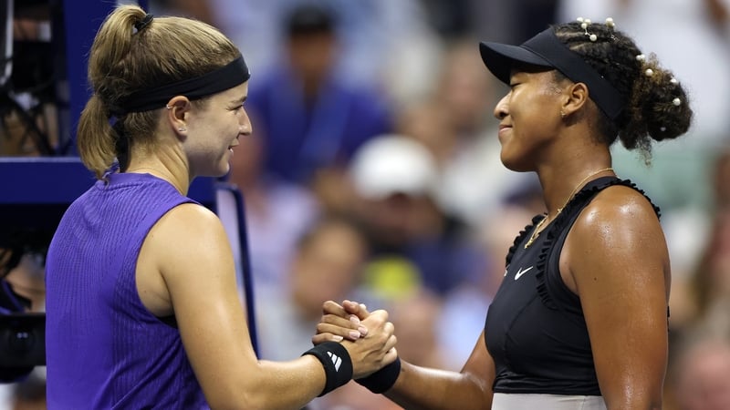 Karolina Muchova (L) of Czech Republic shakes hands with Naomi Osaka after the match