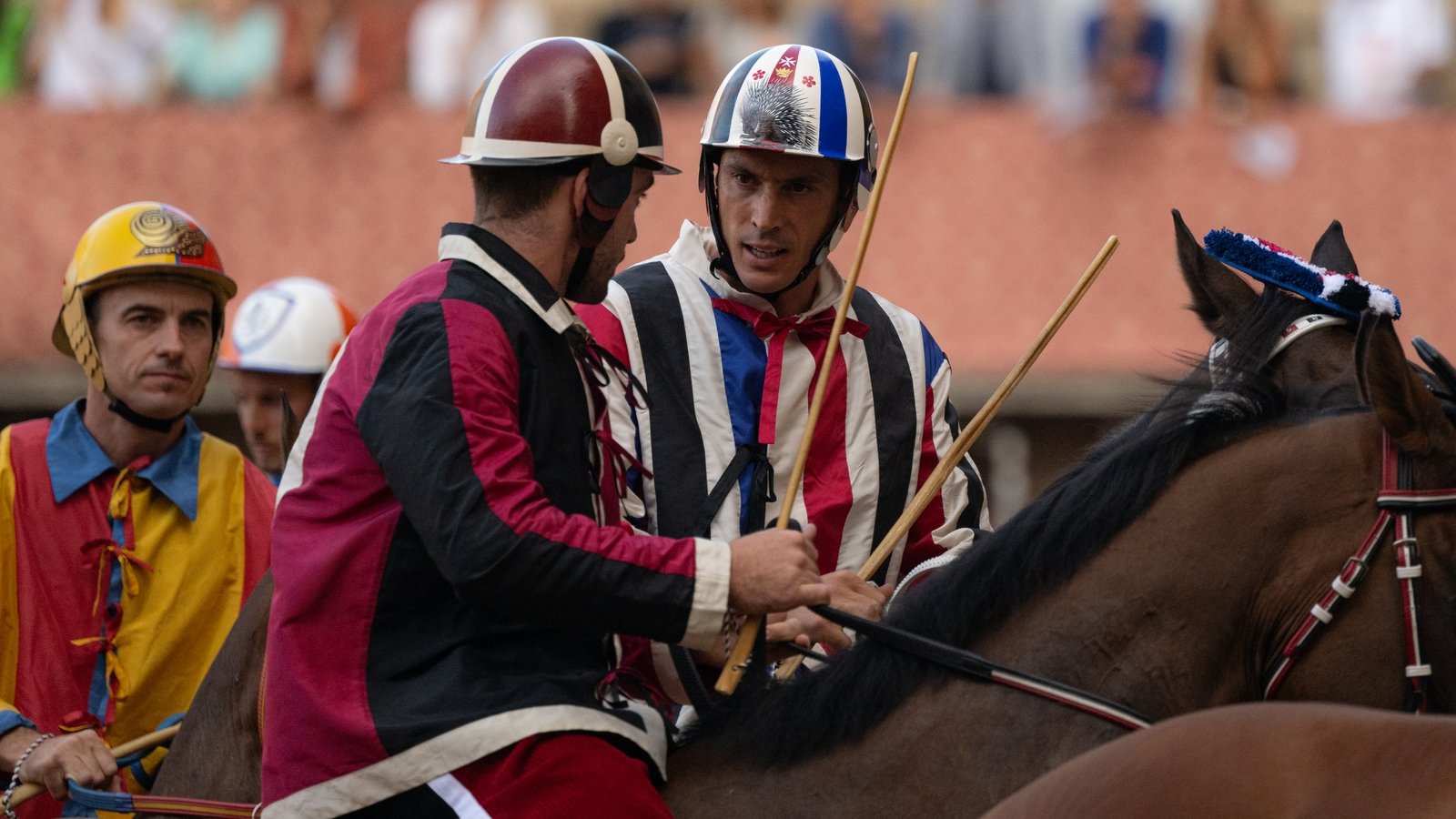 The Istrice (R) and Civetta jockeys before the race